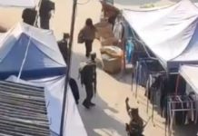 TNLA တပ်သားများ နမ့်ခမ်းမြို့မစျေးထဲ အခွန်ကောက်ကဒ် လိုက်ဝေနေ